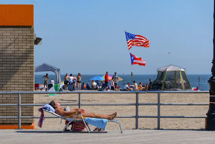 A photo of someone sunbathing on Coney Island
